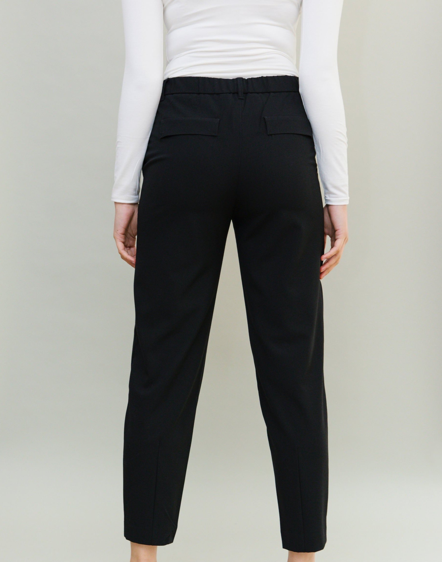Modern Tapered Leg Black Trouser, elasticated waist, pockets and darted taper at hem